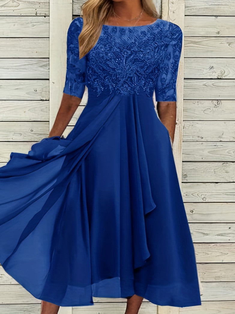 Vestido largo de gasa y encaje con detalles calados