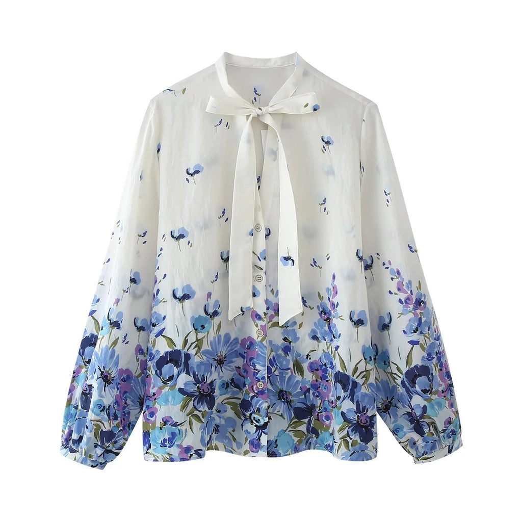 Blusa estampada elegante con lazo