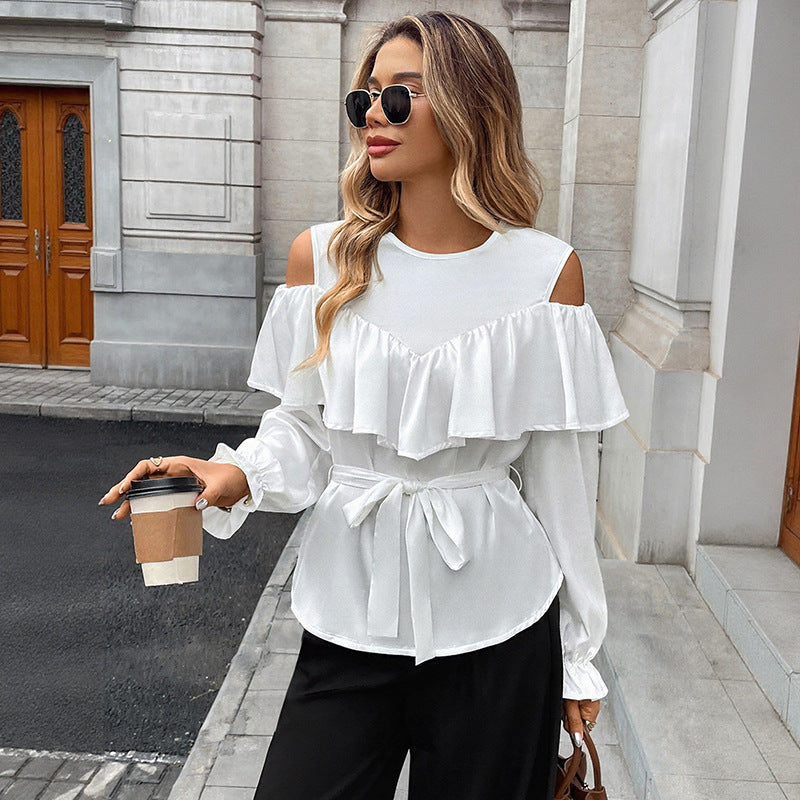 Blusa elegante con volantes y hombros descubiertos