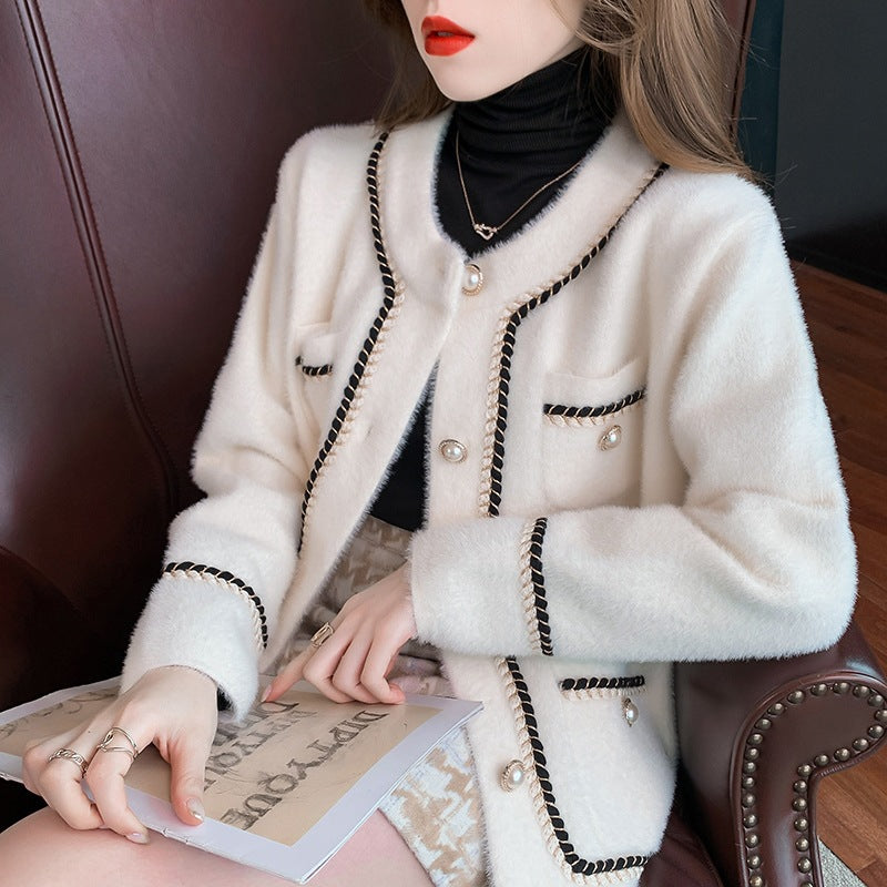Jersey elegante de cuello redondo