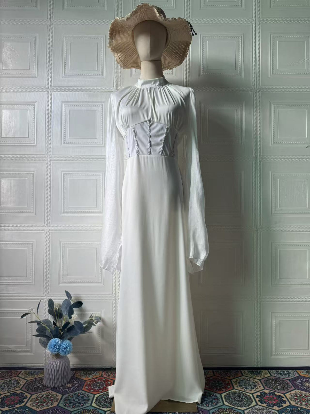 Vestido largo fluido de manga larga y cuello redondo