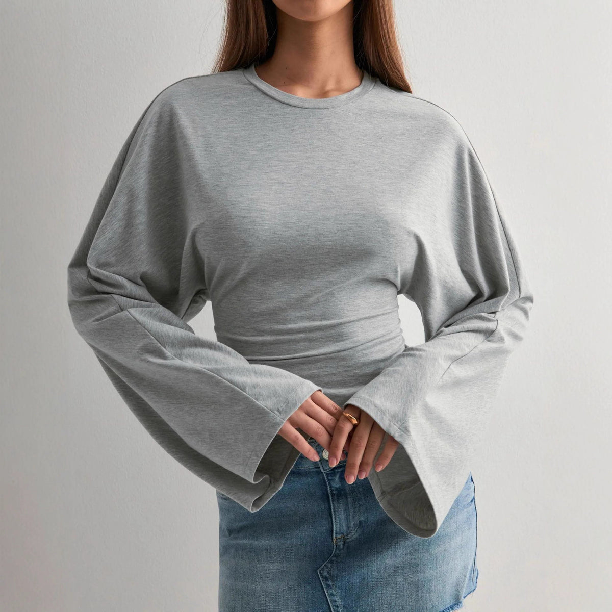 Top ajustado de manga larga con cuello redondo