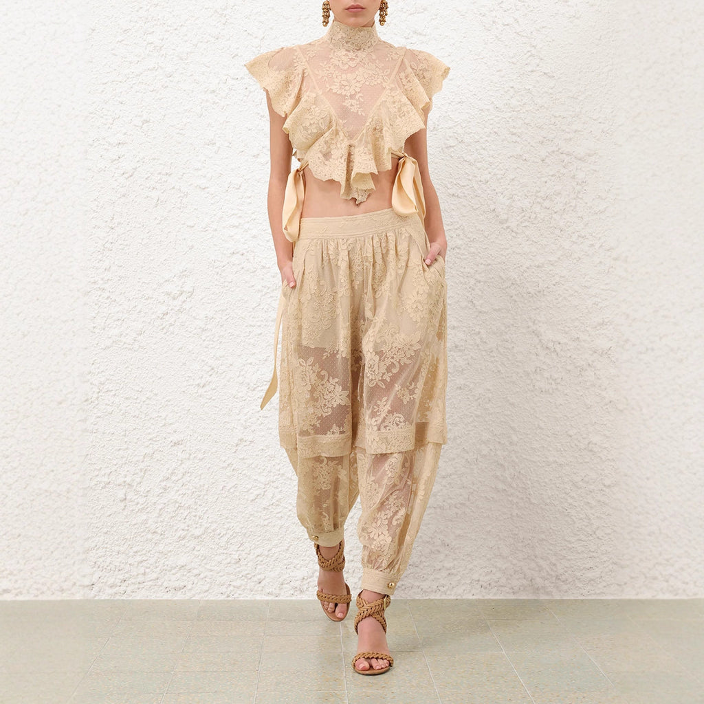 Conjunto sin mangas con top anudado y pantalón holgado