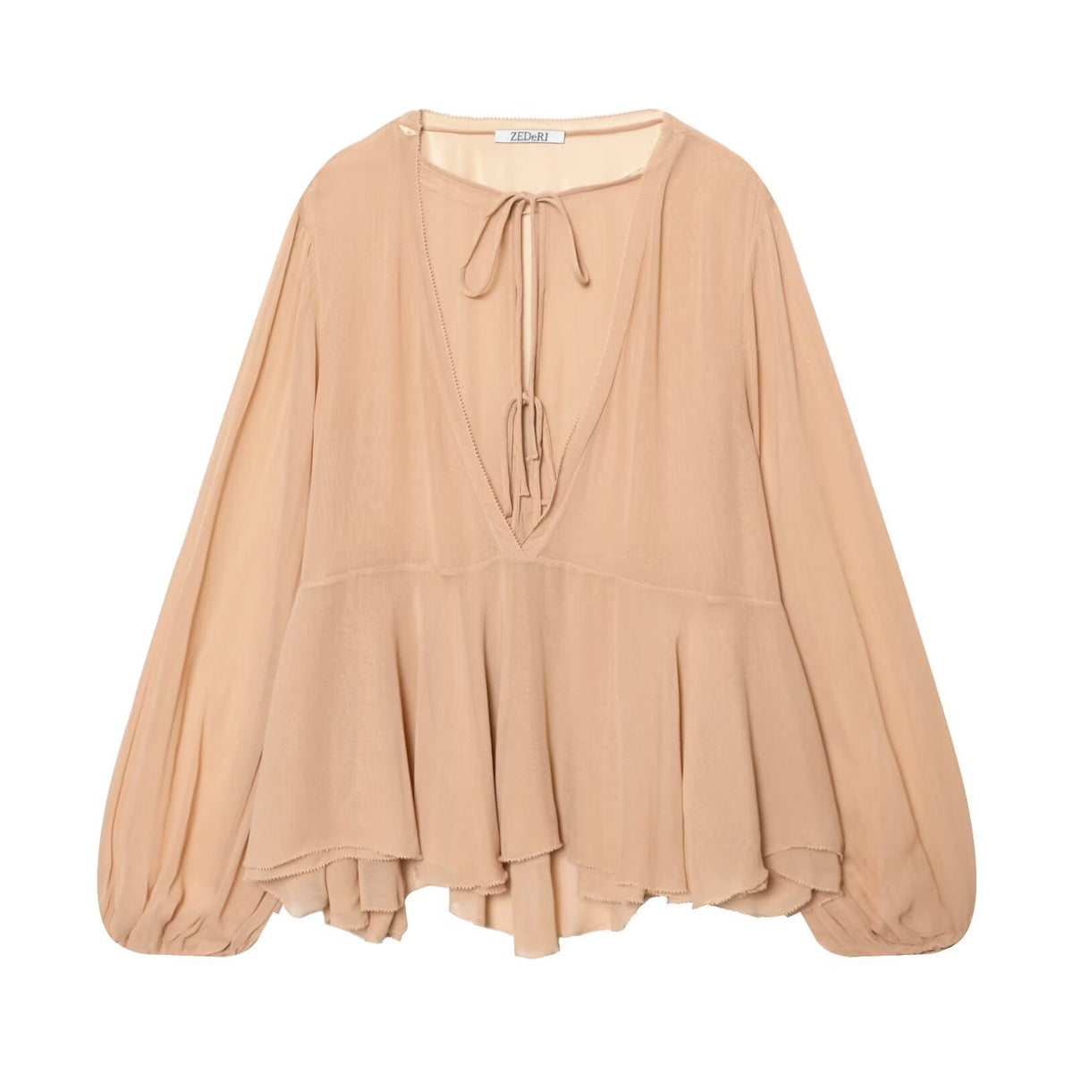 Blusa holgada de manga larga con cuello de volantes