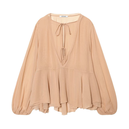Blusa holgada de manga larga con cuello de volantes