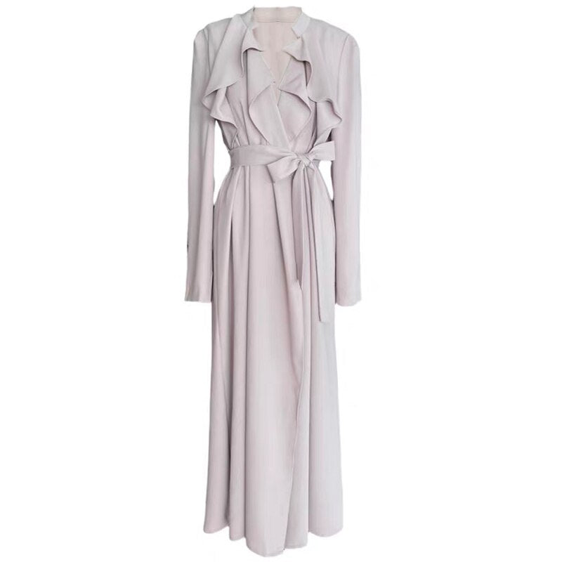Vestido midi cruzado con volantes y lazada