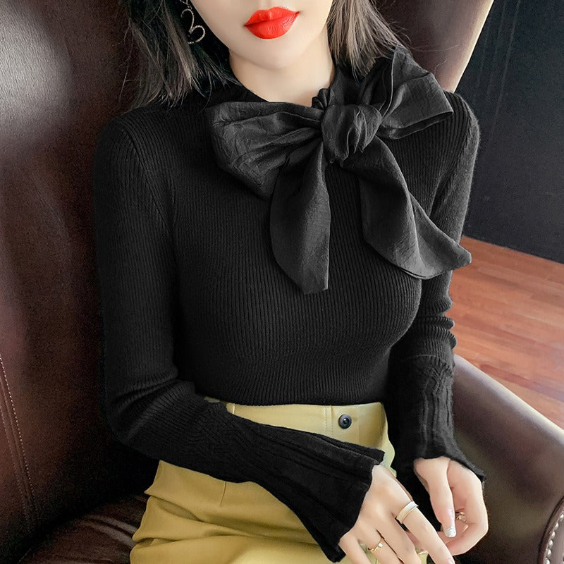 Jersey elegante con gran lazo y manga acampanada