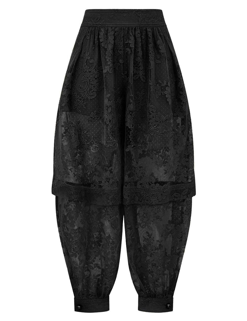 Conjunto sin mangas con top anudado y pantalón holgado