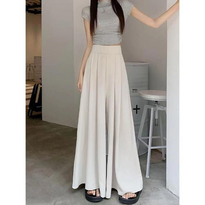 Pantalón falda ancho y fluido de tiro alto
