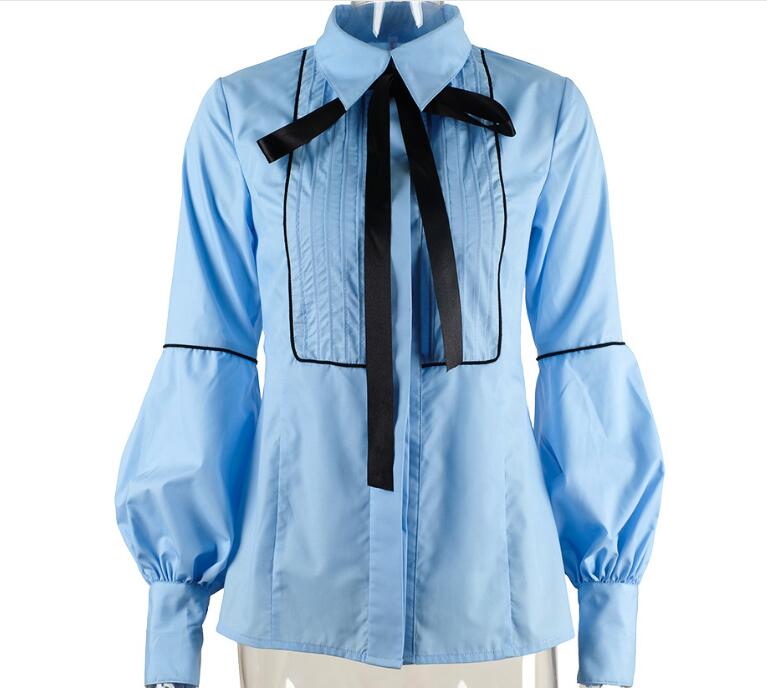Blusa blanca de oficina con lazo y manga farol