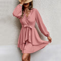 Vestido elegante de manga larga con escote en V y lazada
