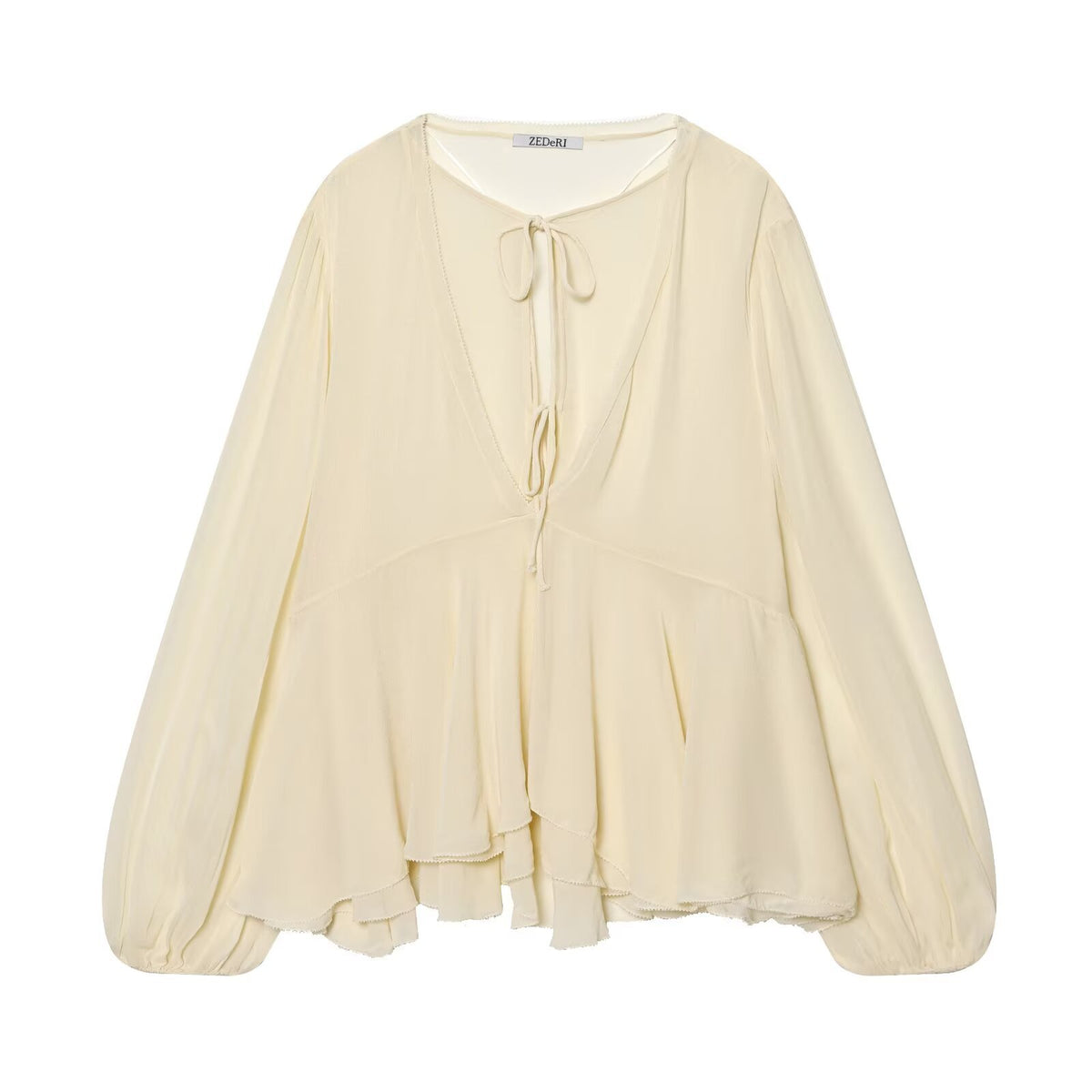 Blusa holgada de manga larga con cuello de volantes