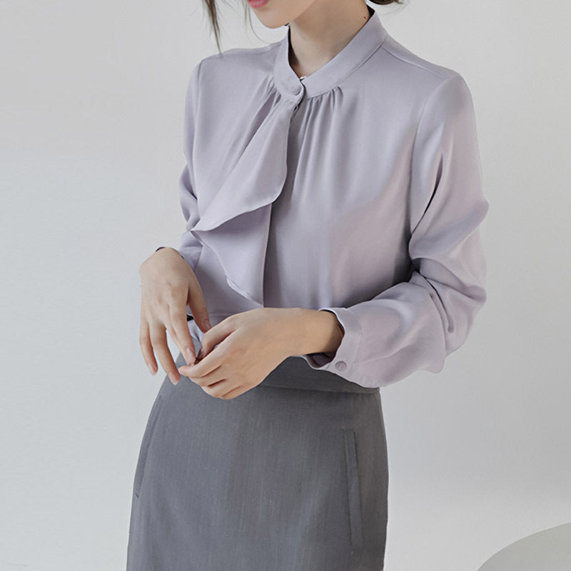 Blusa morada de manga larga con lazo