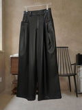 Pantalón negro de efecto piel de cintura alta y pierna ancha