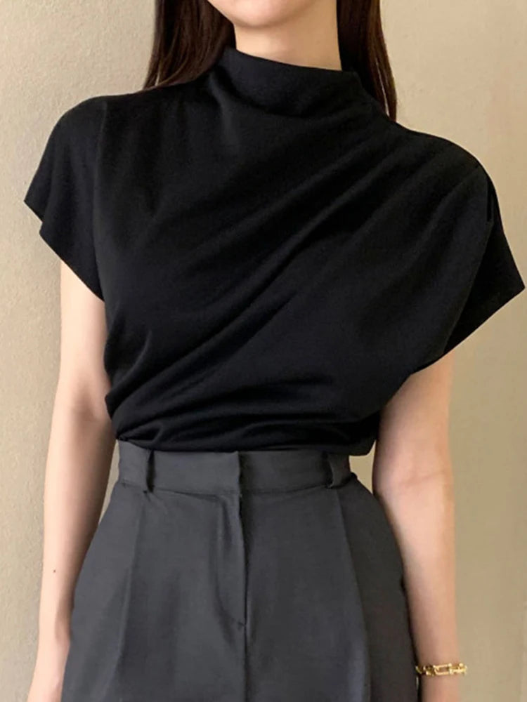 Blusa holgada de manga corta con cuello semialto