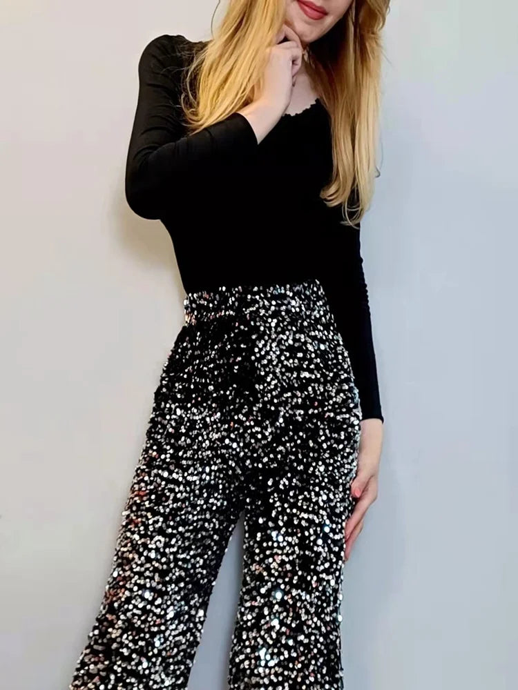 Pantalón brillante de cintura alta y pierna ancha