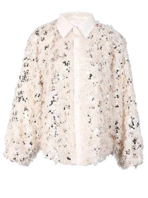 Blusa holgada con lentejuelas y manga larga