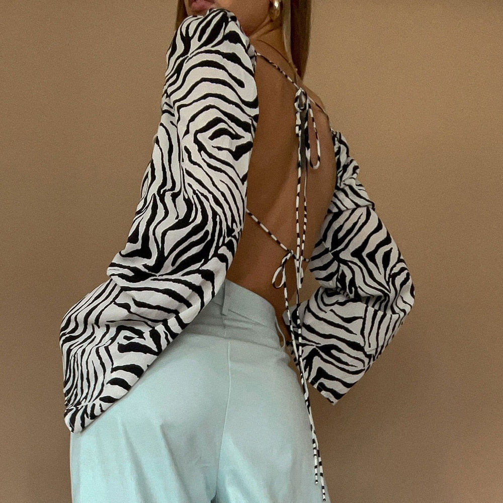Top corto de estampado cebra con espalda abierta y lazada
