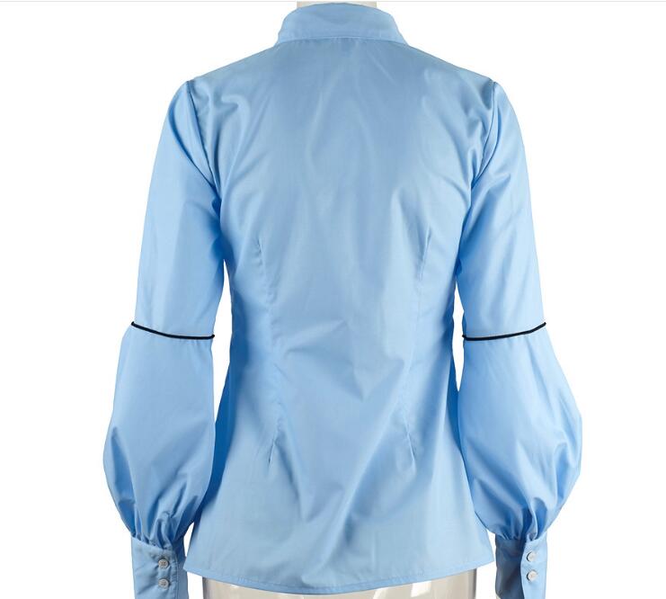 Blusa blanca de oficina con lazo y manga farol