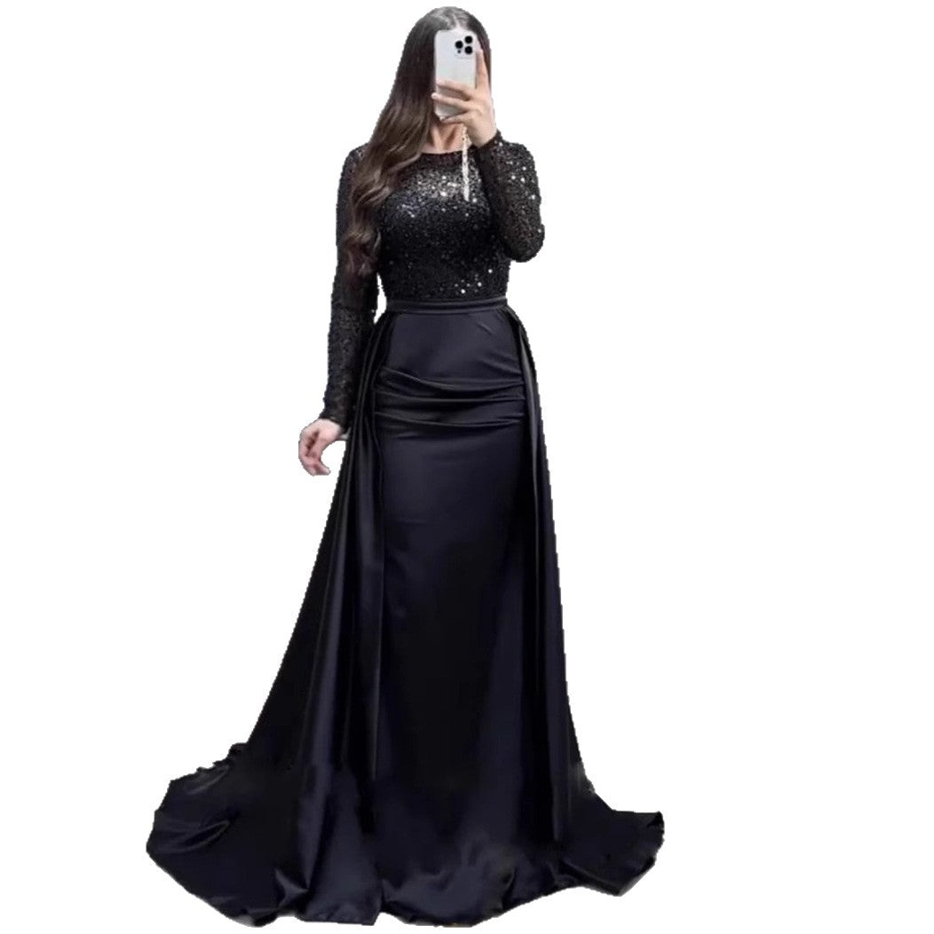 Vestido largo de noche con cuerpo de lentejuelas y falda satinada