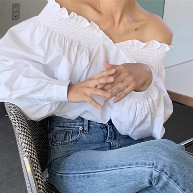 Blusa de hombros descubiertos con manga farol