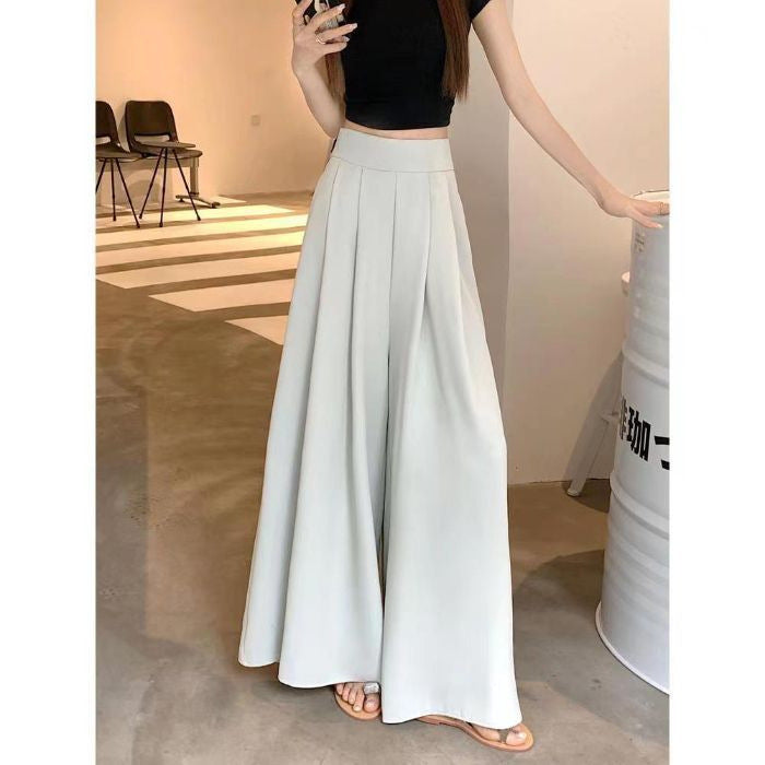 Pantalón falda ancho y fluido de tiro alto
