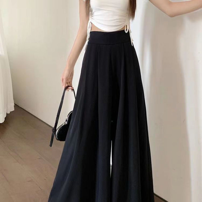Pantalón falda ancho y fluido de tiro alto