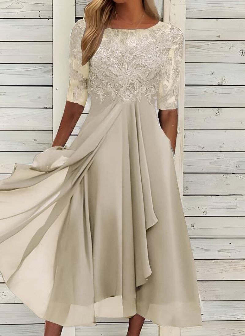 Vestido largo de gasa y encaje con detalles calados