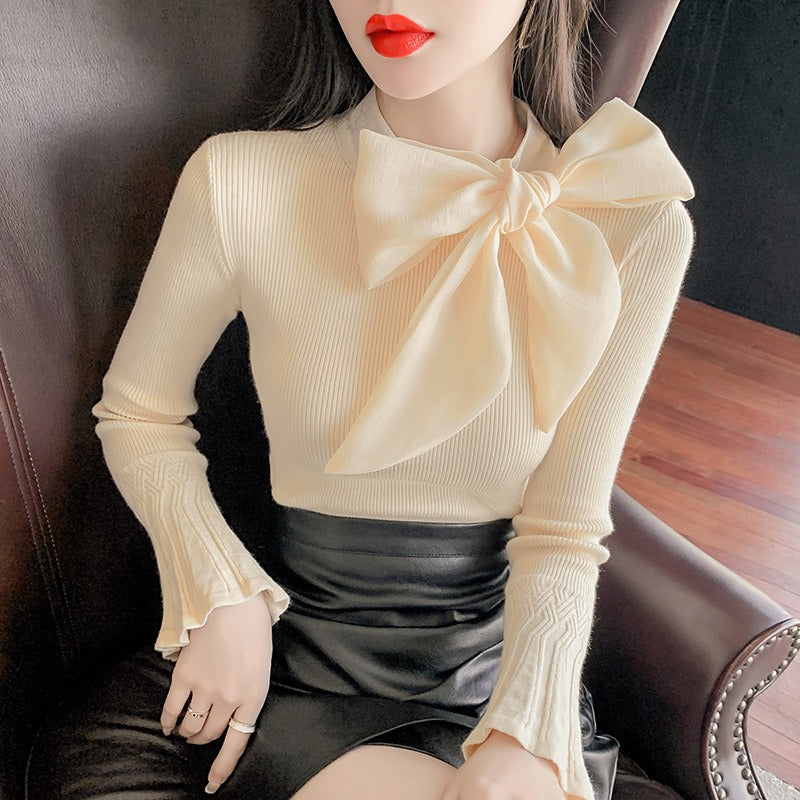 Jersey elegante con gran lazo y manga acampanada