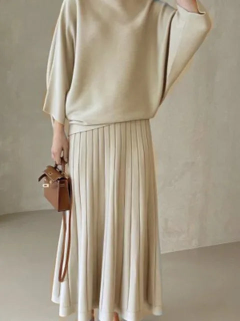 Conjunto de punto de jersey y falda plisada
