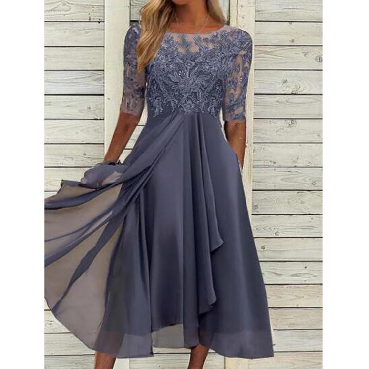 Vestido largo de gasa y encaje con detalles calados