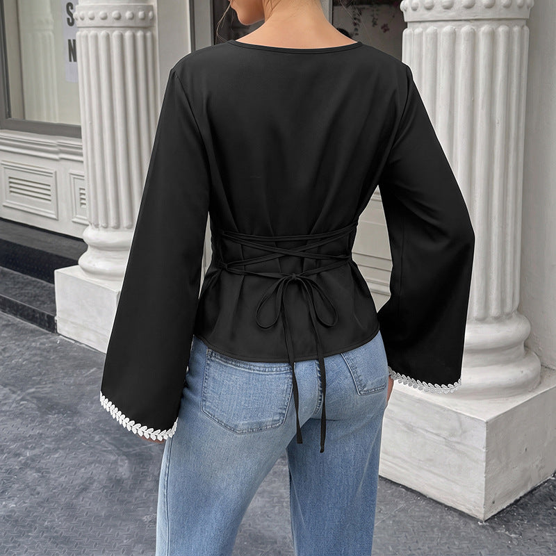 Camisa elegante de manga larga con encaje y escote barco