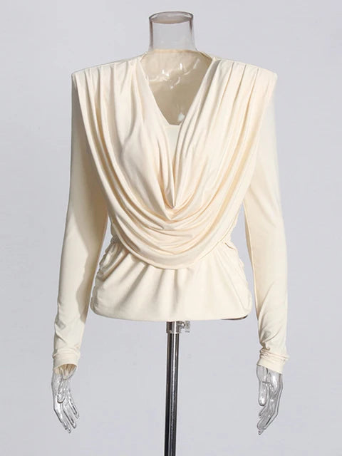 Top elegante de manga larga con cuello drapeado
