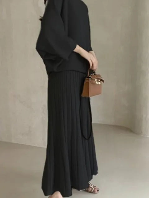 Conjunto de punto de jersey y falda plisada