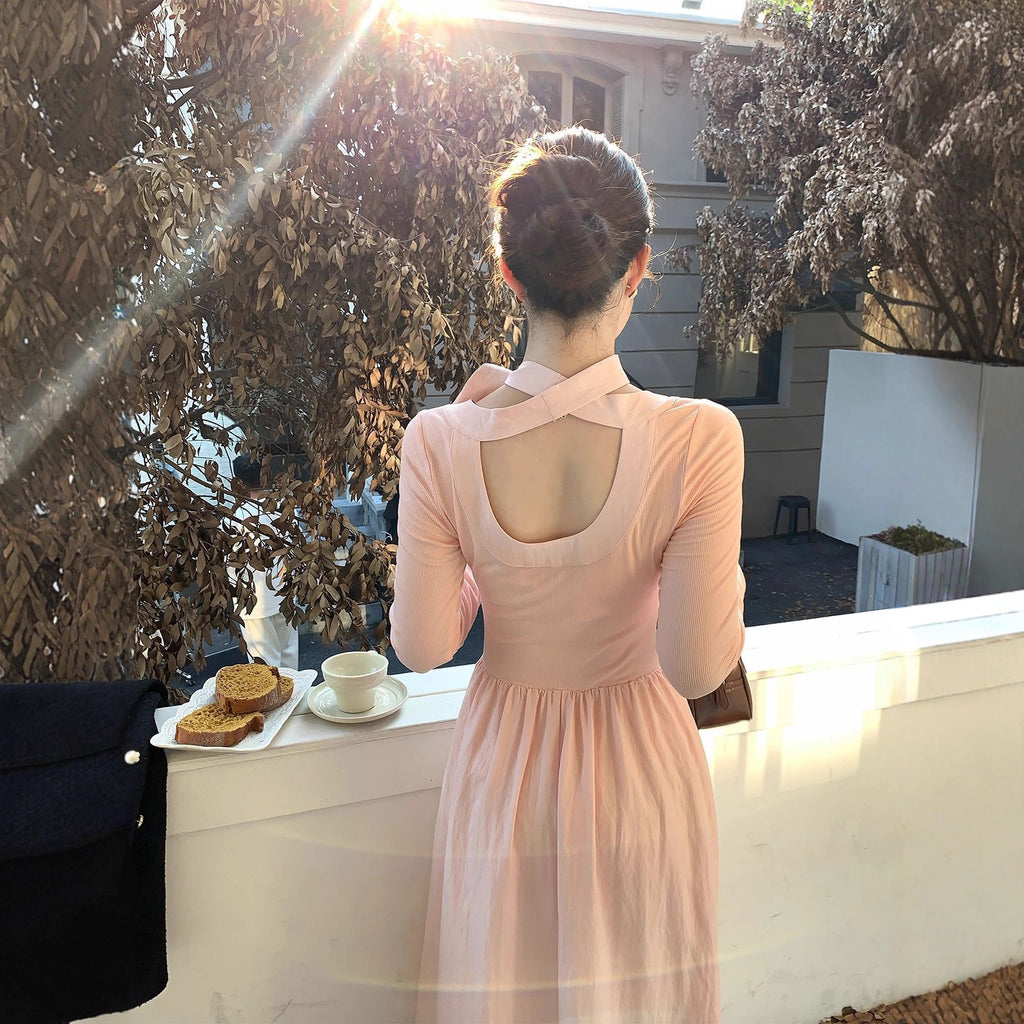 Vestido midi rosa de manga larga con lazo