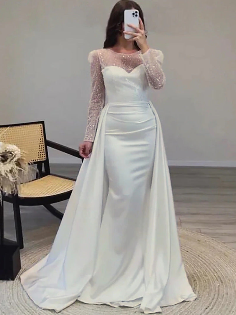 Vestido largo de noche con cuerpo de lentejuelas y falda satinada