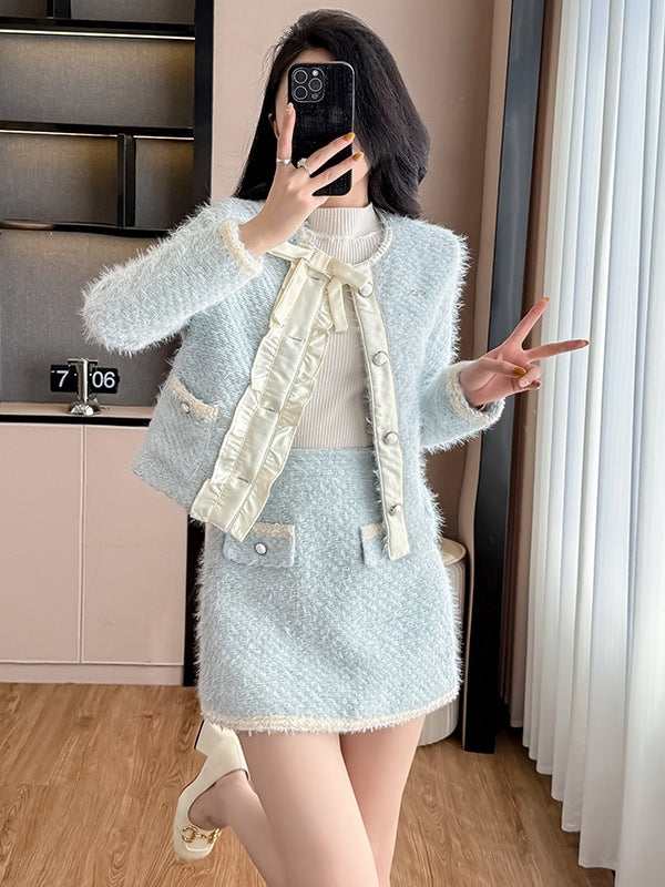Conjunto azul de blazer y falda de cintura alta