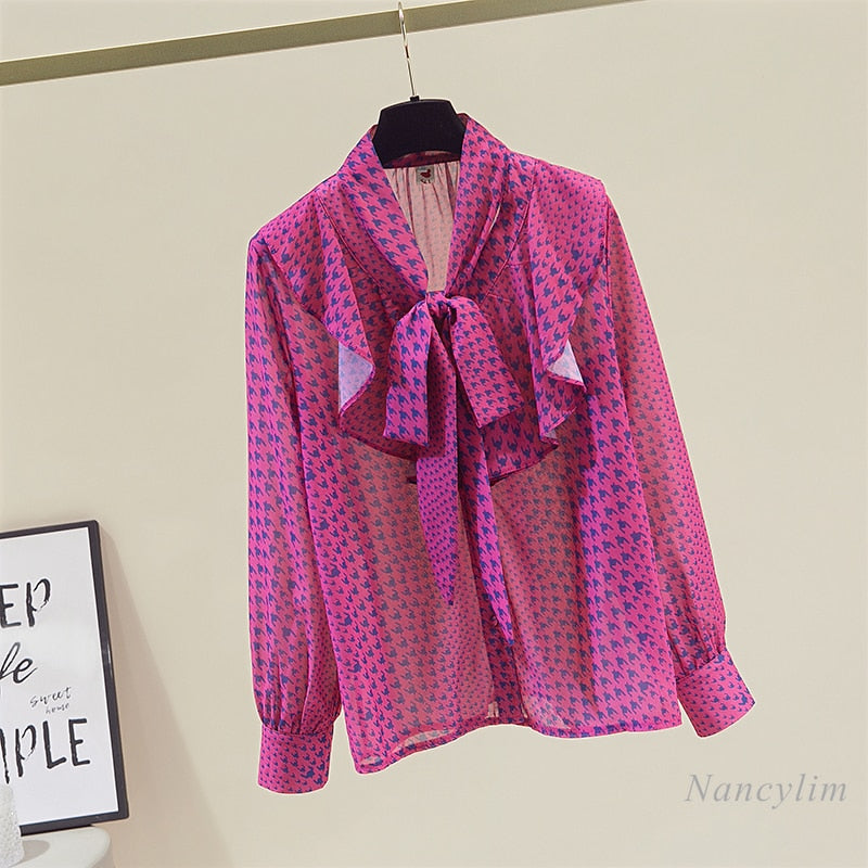 Blusa de gasa con lazada y volantes