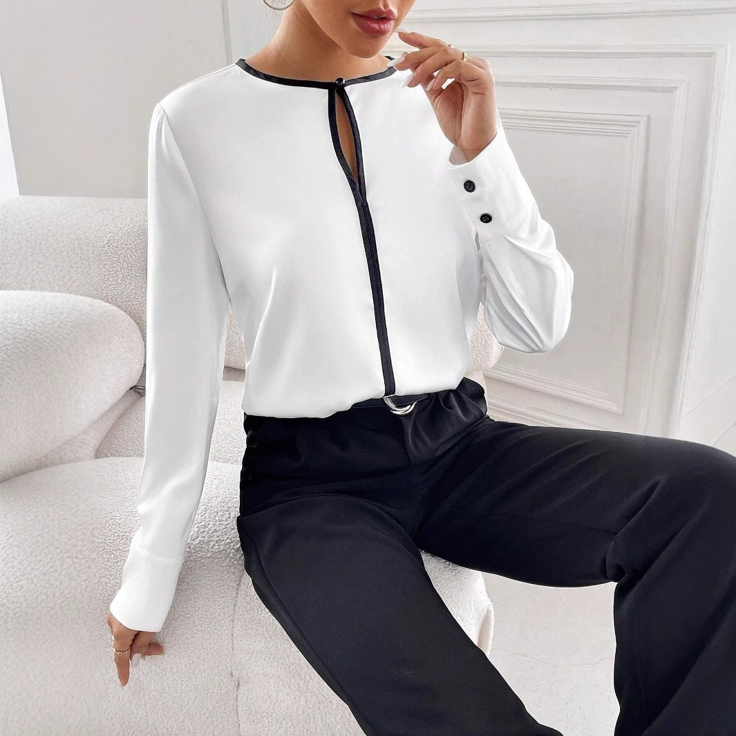 Blusa bicolor de manga larga con cuello redondo