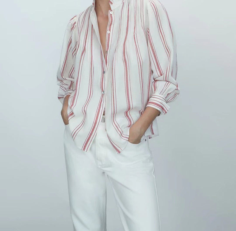 Blusa roja de rayas con volantes y manga larga