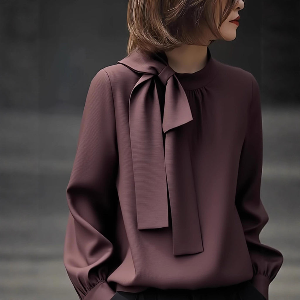 Blusa elegante de cuello alto y manga extralarga