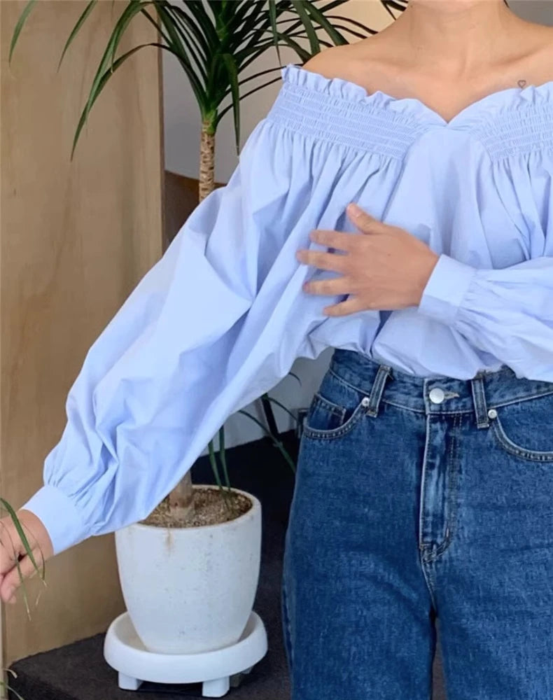 Blusa de hombros descubiertos con manga farol