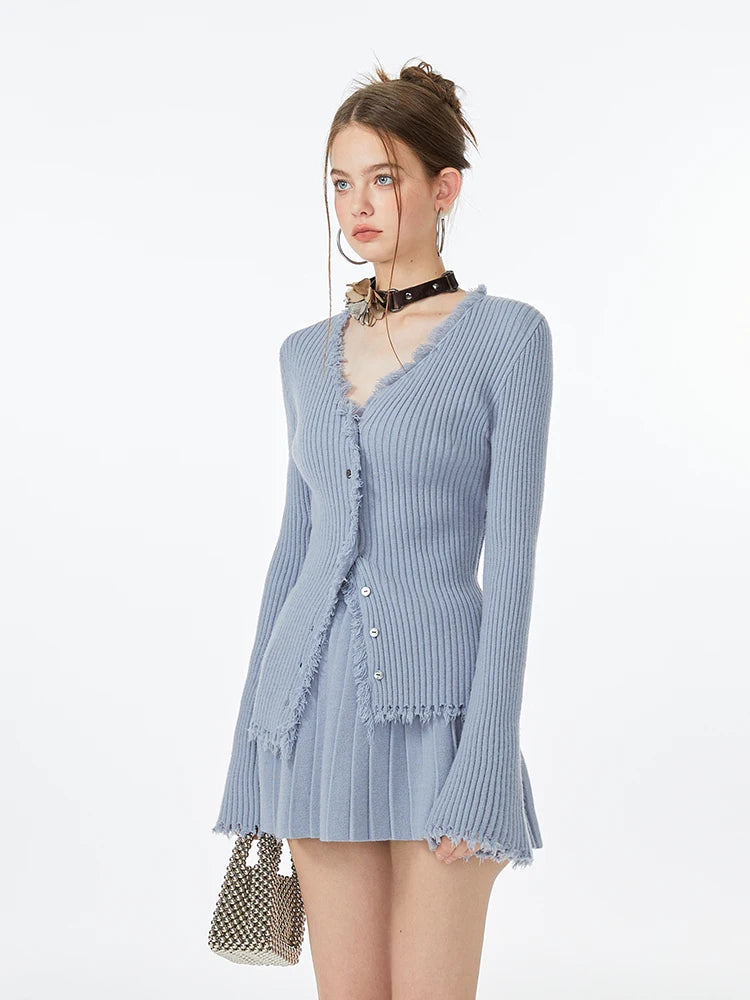 Conjunto vintage de cárdigan con flecos y minifalda plisada