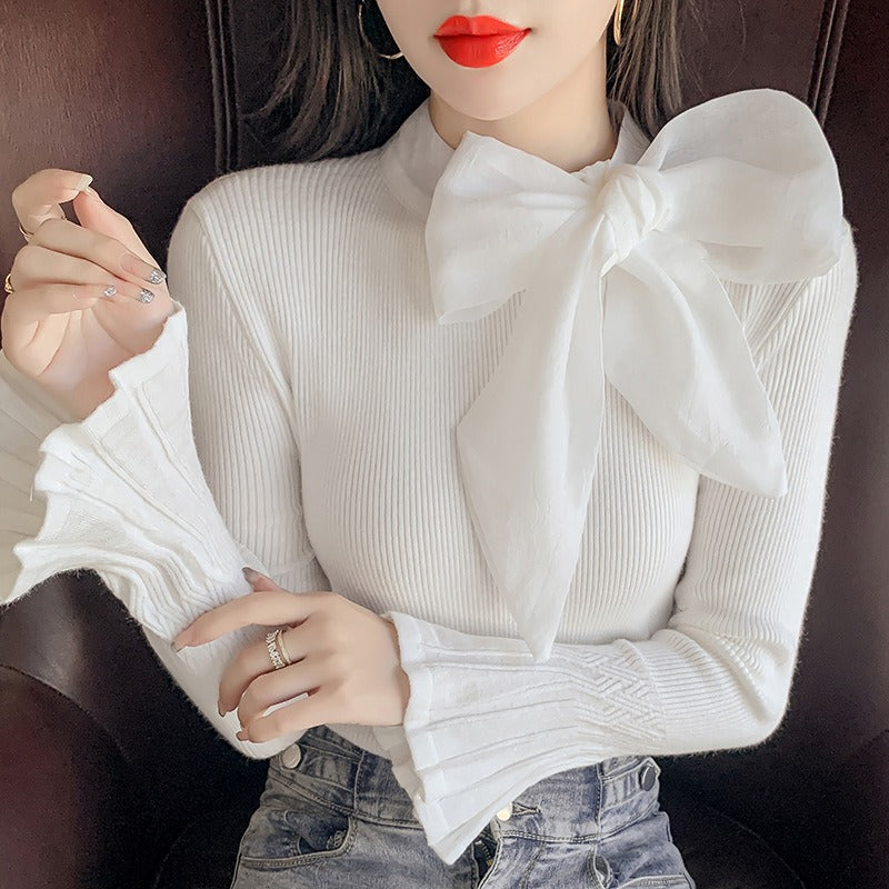 Jersey elegante con gran lazo y manga acampanada