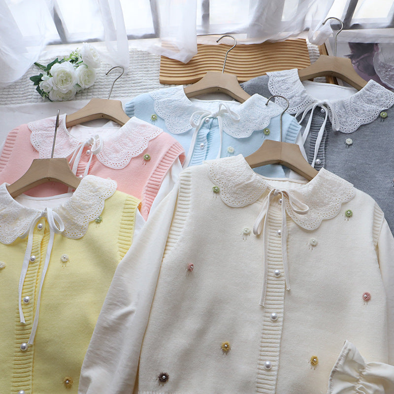 Conjunto de camisa y chaleco de punto