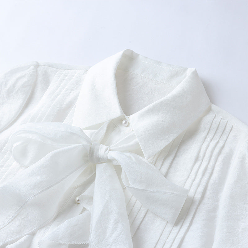 Blusa elegante de Tencel con lazo y cuello camisero