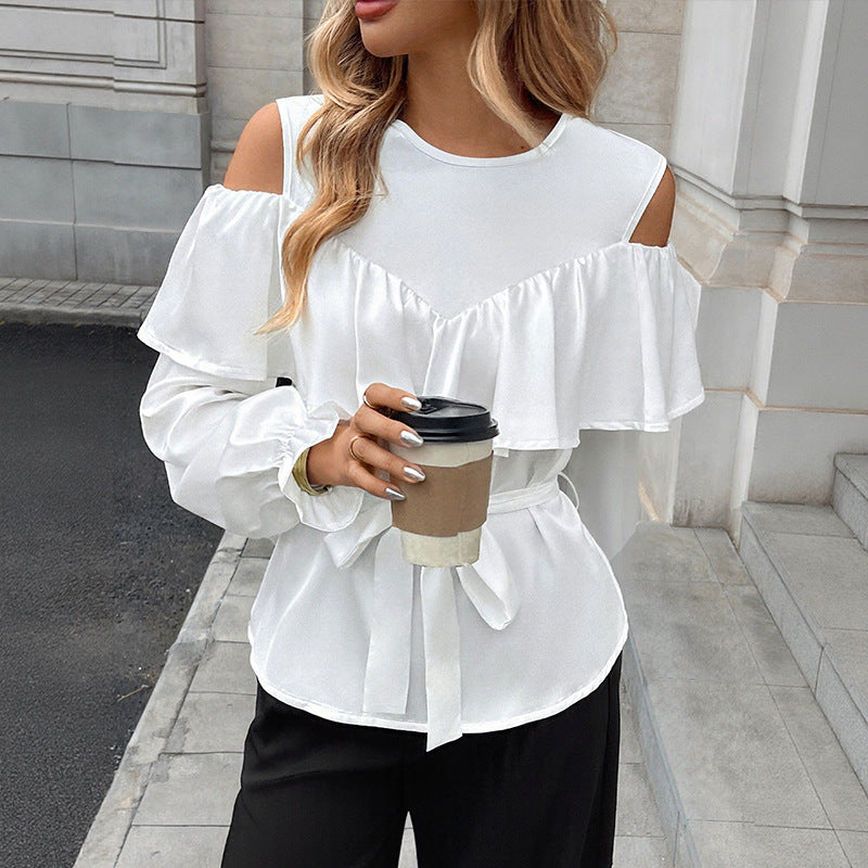 Blusa elegante con volantes y hombros descubiertos