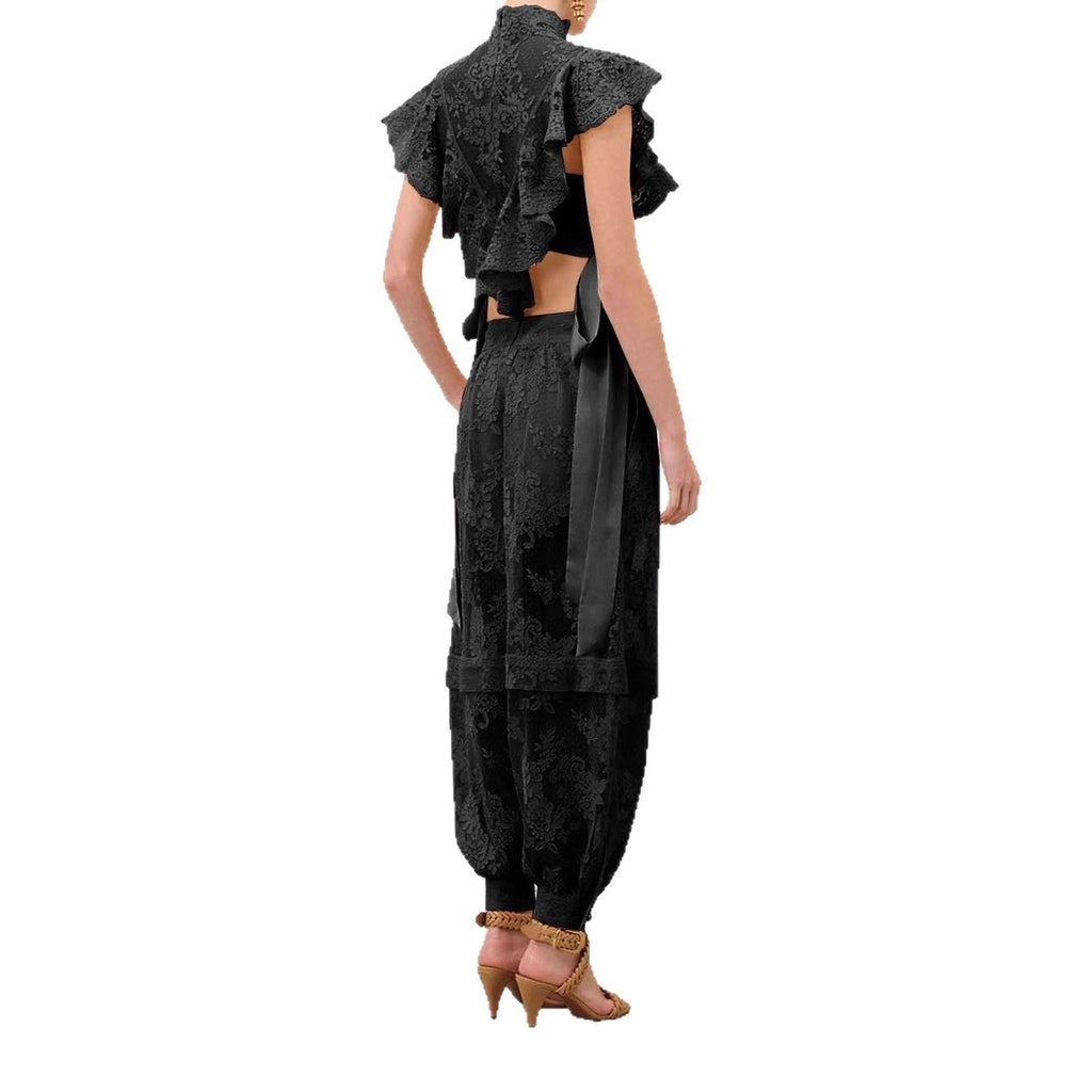 Conjunto sin mangas con top anudado y pantalón holgado