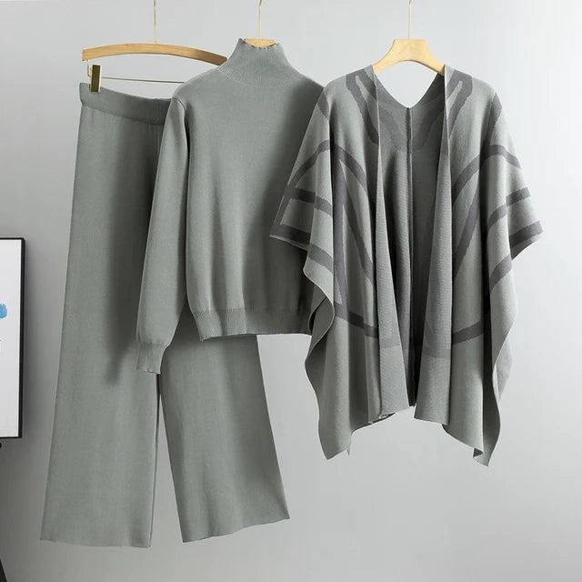 Conjunto de punto de tres piezas: chal de rayas, top de cuello alto y pantalón ancho