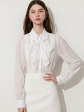 Blusa elegante de Tencel con lazo y cuello camisero